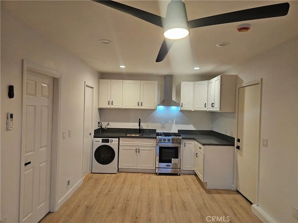 Photo of 324 E Citron Street, Corona, CA 92879 (MLS # SW26009044)