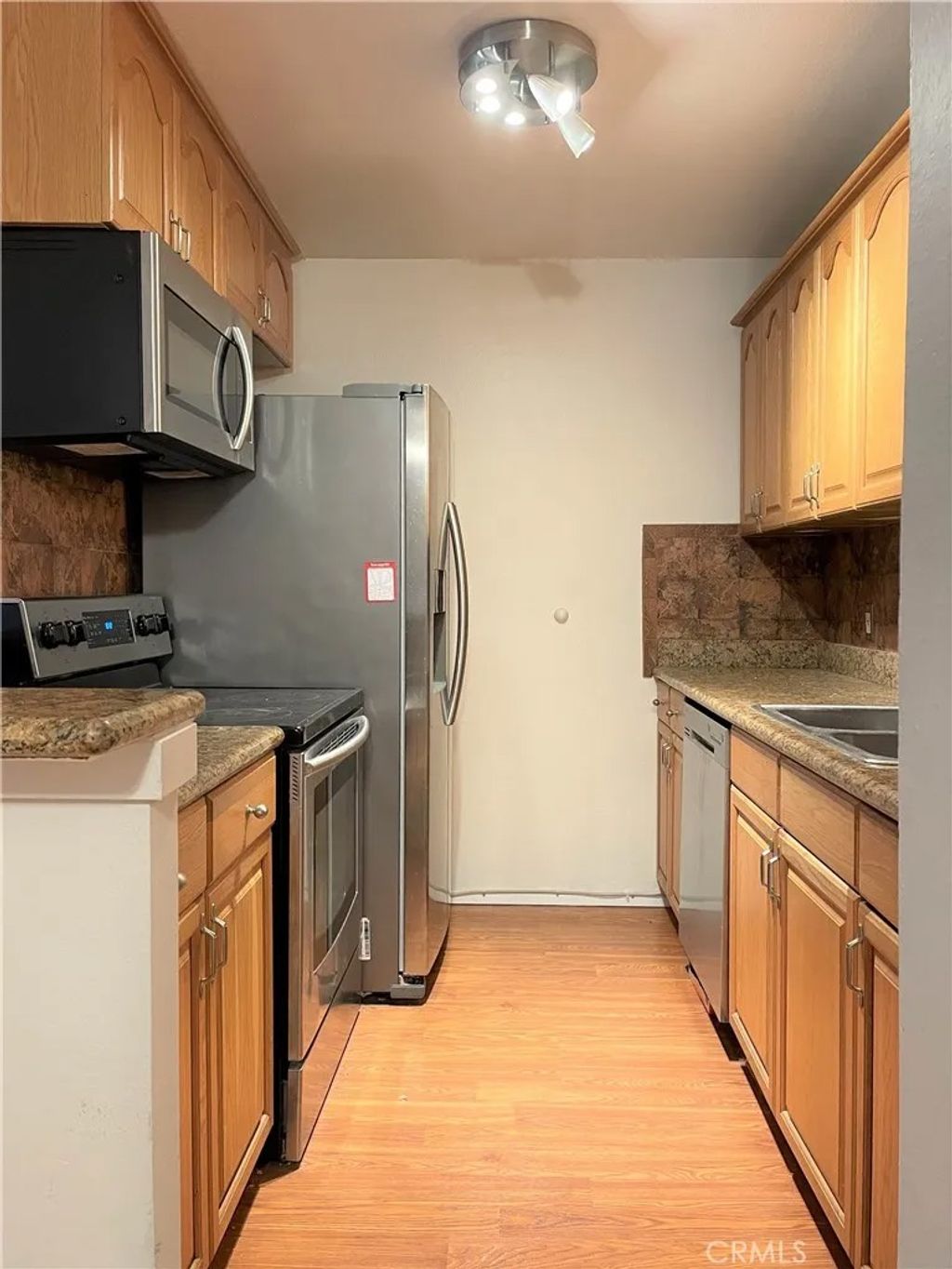 Photo of 3602 W Estates Ln, #211 Ln, Rolling Hills Estates, CA 90274 (MLS # SB26070240)