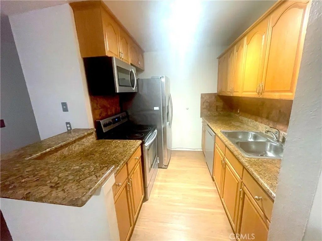 Photo of 3602 W Estates Ln, #211 Ln, Rolling Hills Estates, CA 90274 (MLS # SB26070240)