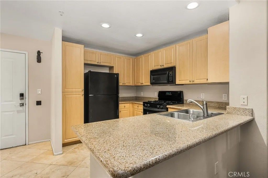 Photo of 2304 Watermarke Pl, Irvine, CA 92612 (MLS # OC25279074)