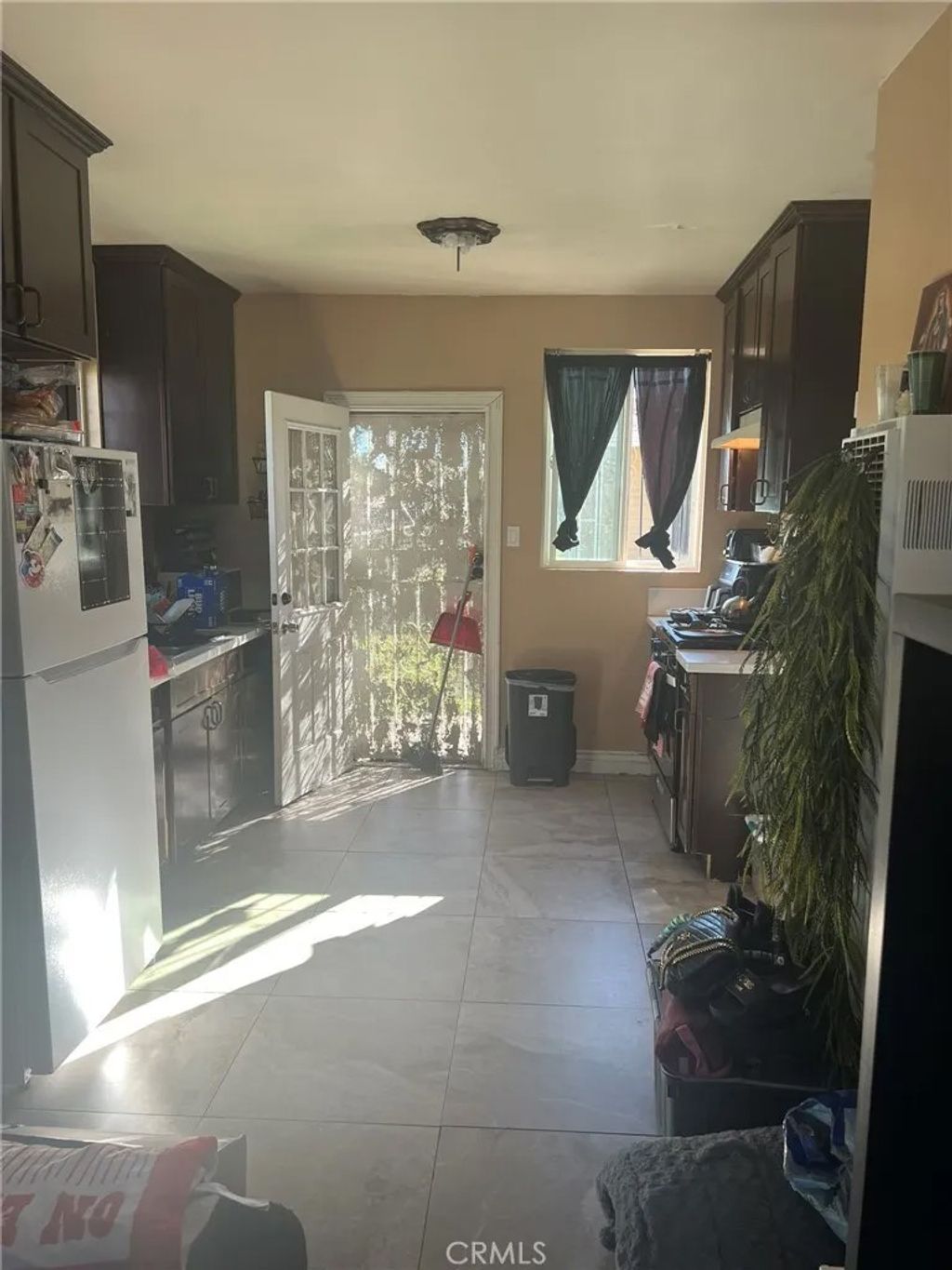 Photo of 2000 W 54th St, Los Angeles, CA 90062 (MLS # IN26016451)