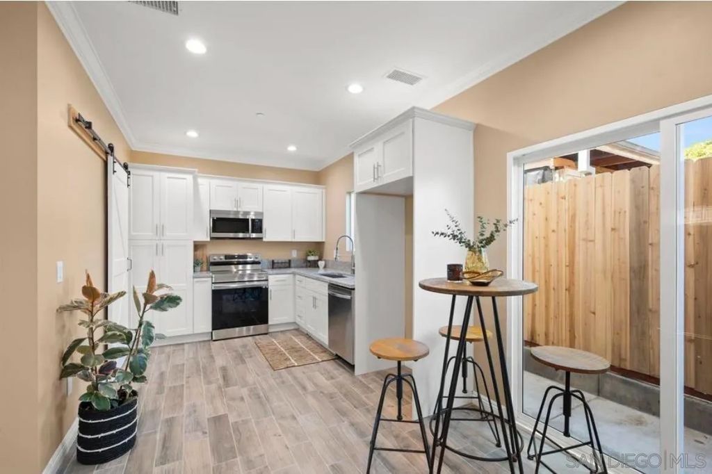 Photo of 911 Concepcion Ave, Spring Valley, CA 91977 (MLS # 260008468)