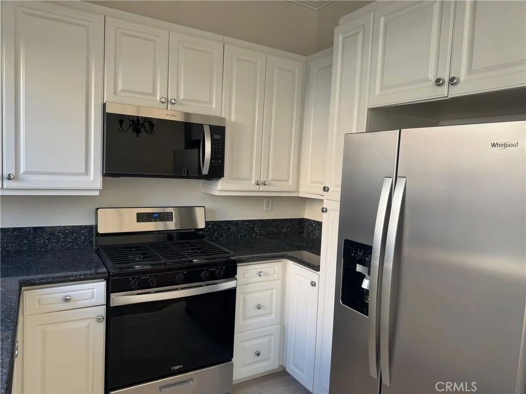 Photo of 9 Torrigiani Aisle, Irvine, CA 92606 (MLS # OC26012161)