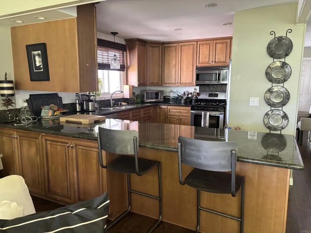 Photo of 7234 Santa Barbara St #319, Carlsbad, CA 92011 (MLS # NDP2510083)