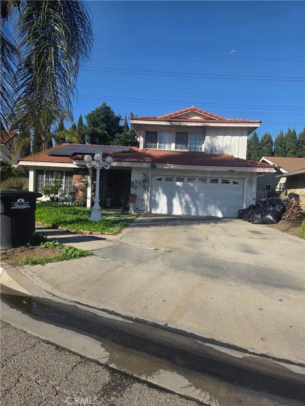 Photo of 9301 Karmont Avenue, South Gate, CA 90280 (MLS # CV25280219)