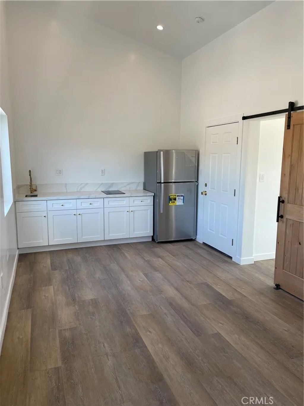 Photo of 24308 Victory Boulevard, Woodland Hills, CA 91367 (MLS # SR26008181)