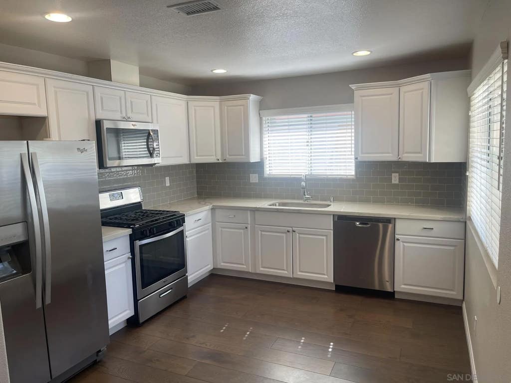 Photo of 1255 Corte Famosa, San Marcos, CA 92069 (MLS # 260019311)