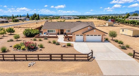 Photo of 9275 Rattlesnake Rd, Phelan, CA 92371 (MLS # HD26222636)
