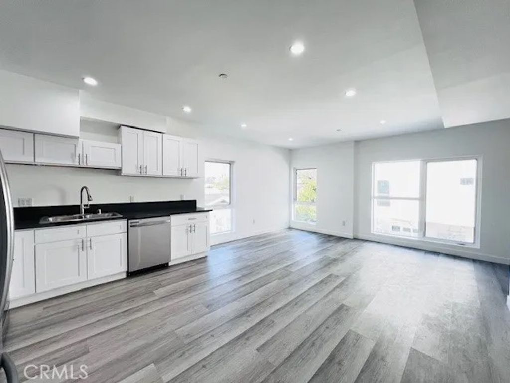 Photo of 1258 Leighton Avenue, Los Angeles, CA 90037 (MLS # TR26020935)