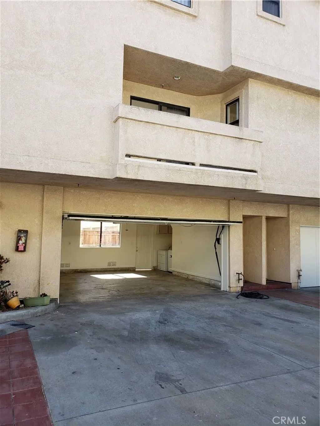 Photo of 7882 Holt Drive #2, Huntington Beach, CA 92647 (MLS # NP25280230)