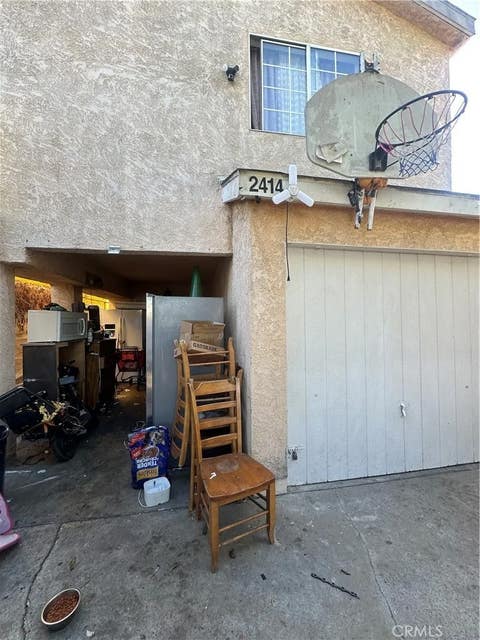 Photo of 2414 E 115th PL, Los Angeles, CA 90059 (MLS # DW26104355)