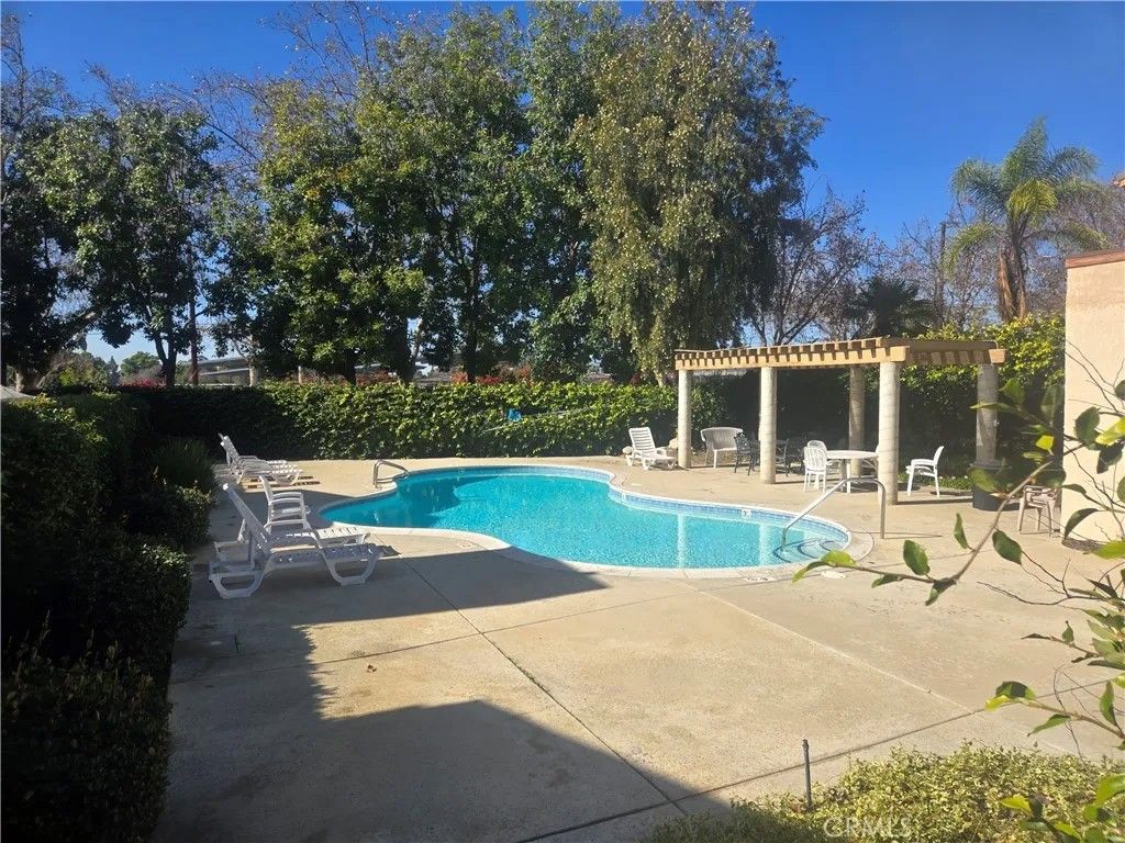 Photo of 2260 N Towne Ave, Pomona, CA 91767 (MLS # PW26024392)