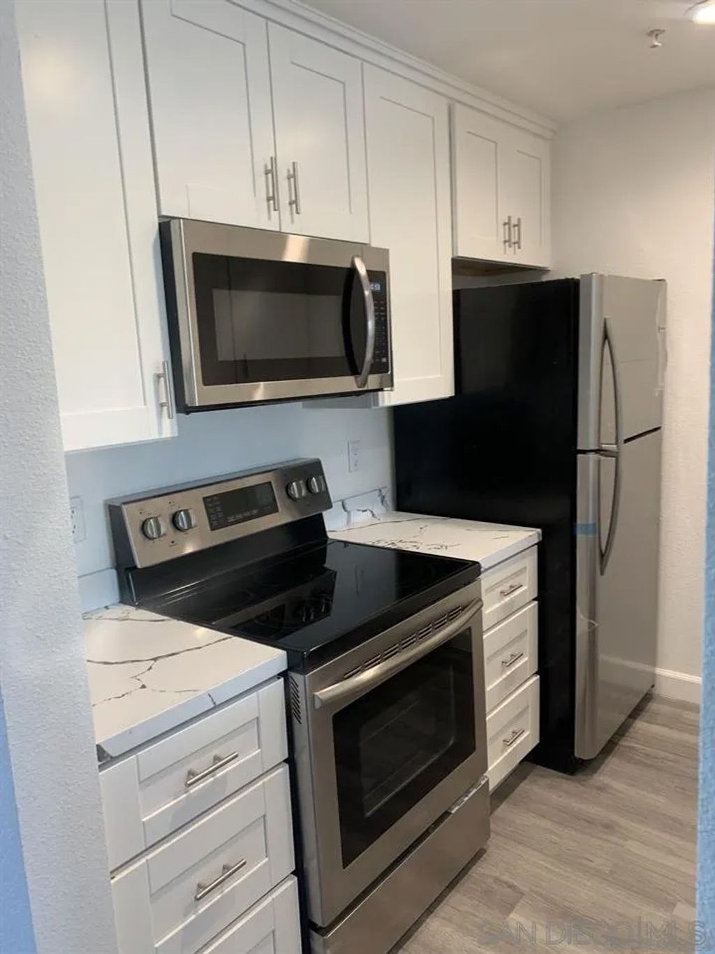 Photo of 4041 Oakcrest Dr #206, San Diego, CA 92105 (MLS # 250044272)