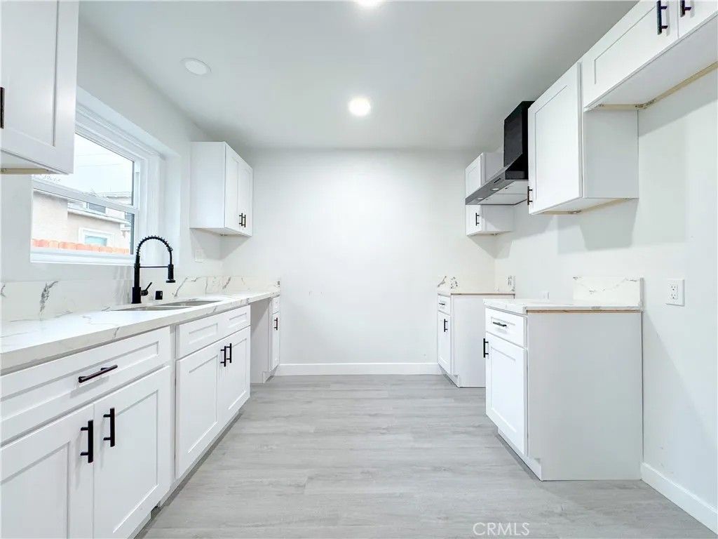 Photo of 5557 Lemon Avenue, Long Beach, CA 90805 (MLS # IG25245792)