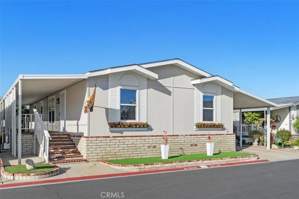 Photo of 1456 E Philadelphia St Spc 145 St, Ontario, CA 91761 (MLS # IV26050578)