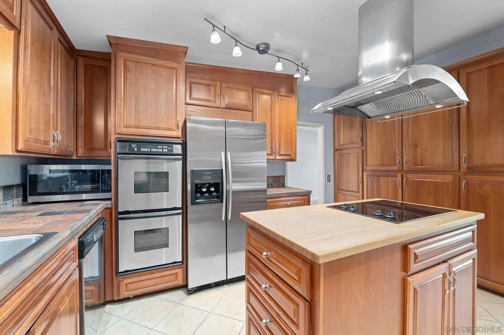 Photo of 4062 S Tropico Dr, La Mesa, CA 91941 (MLS # 250041337)