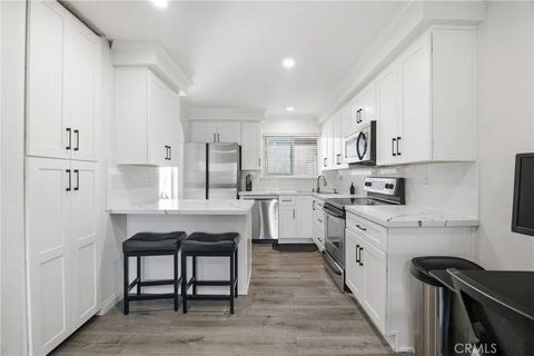 Photo of 1722 Mitchell Ave #136, Tustin, CA 92780 (MLS # OC26042772)