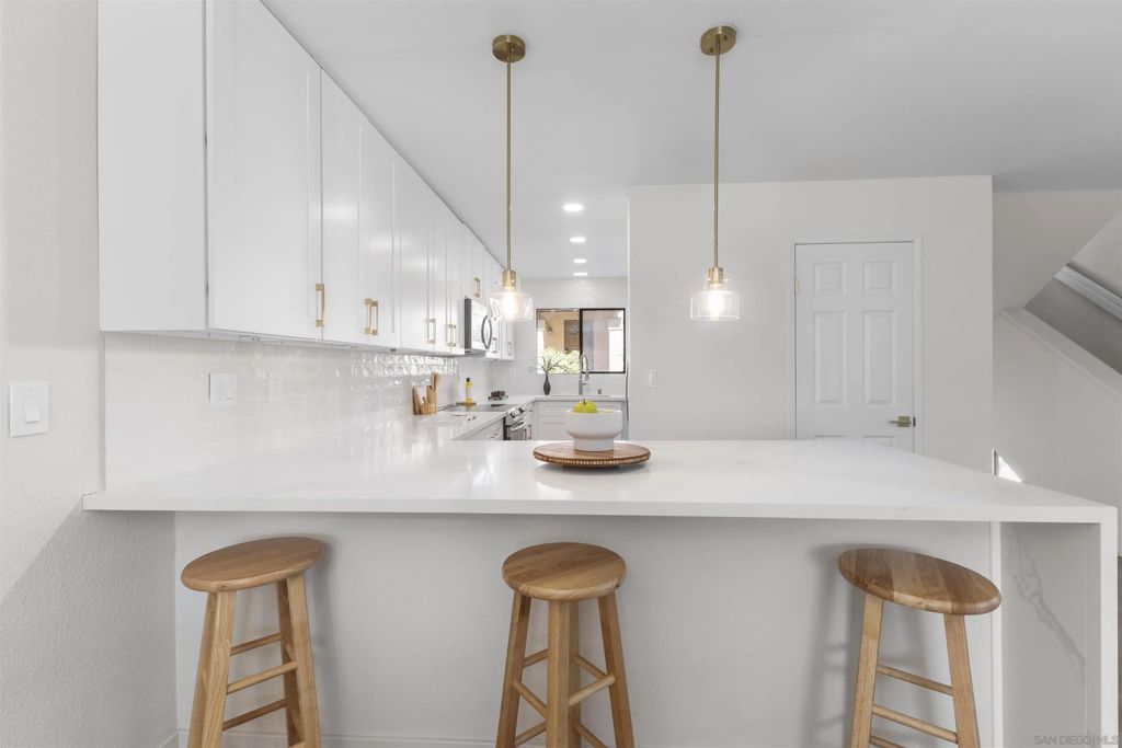 Photo of 5878 Mission Center Rd #A, San Diego, CA 92123 (MLS # 260005218)