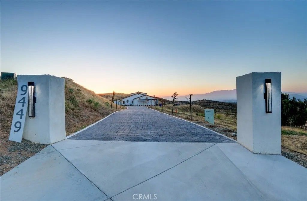 Photo of 9449 Equestrian Drive, Riverside, CA 92503 (MLS # IV26104141)