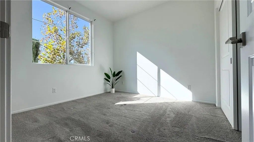 Photo of 936 Savi Drive #104, Corona, CA 92878 (MLS # OC25276665)