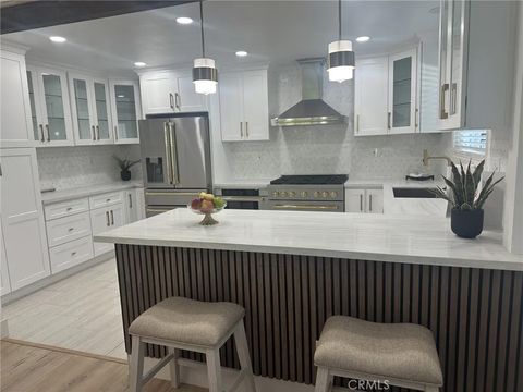 Photo of 3540 Armourdale Ave, Long Beach, CA 90808 (MLS # DW26056517)