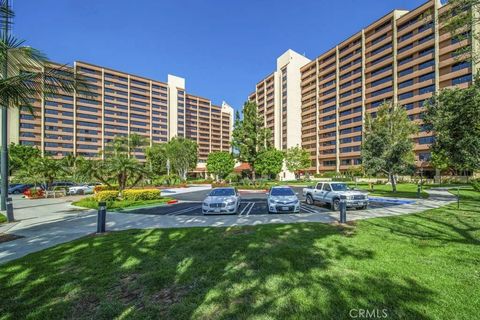 Photo of 24055 Paseo Del Lago #1201, Laguna Woods, CA 92637 (MLS # OC26044114)