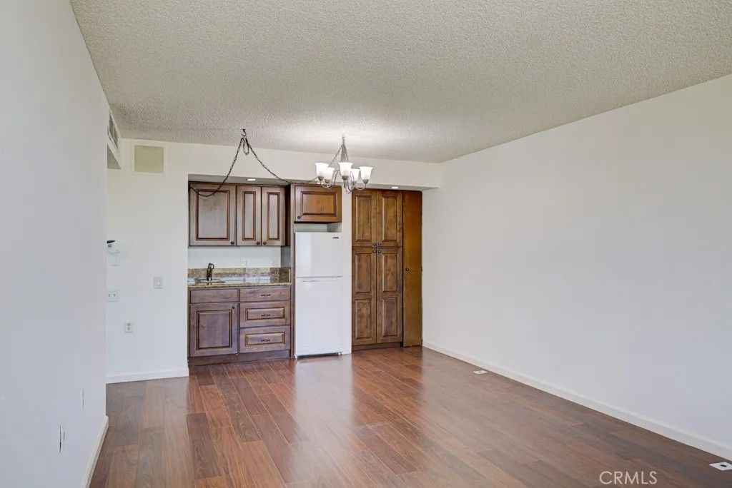 Photo of 24055 Paseo Del Lago #1201, Laguna Woods, CA 92637 (MLS # OC26044114)