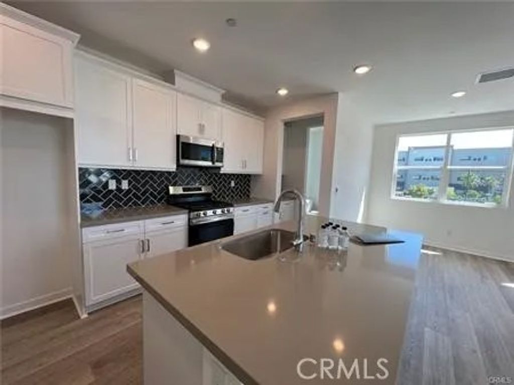 Photo of 947 N Divino Privado #10, Ontario, CA 91764 (MLS # TR26049581)