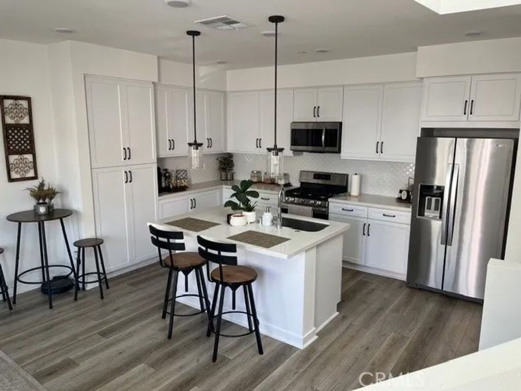 Photo of 11012 Momentum Dr, Rancho Cucamonga, CA 91730 (MLS # OC26077150)