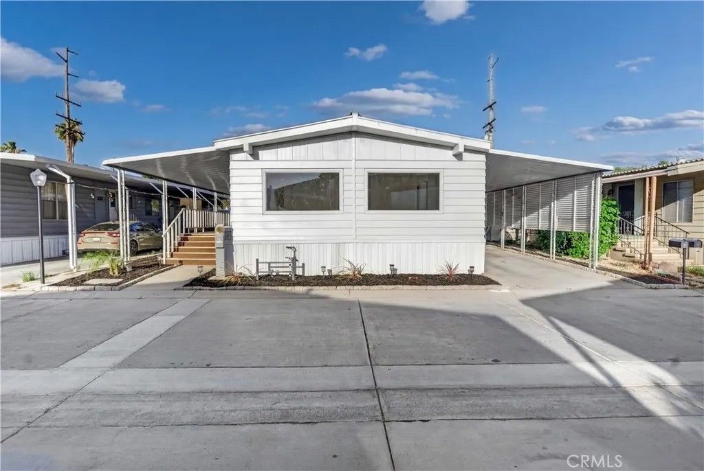 Photo of 27701 Murrieta Rd #5, Menifee, CA 92586 (MLS # SW26117429)