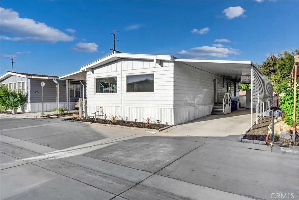 Photo of 27701 Murrieta Rd #5, Menifee, CA 92586 (MLS # SW26117429)