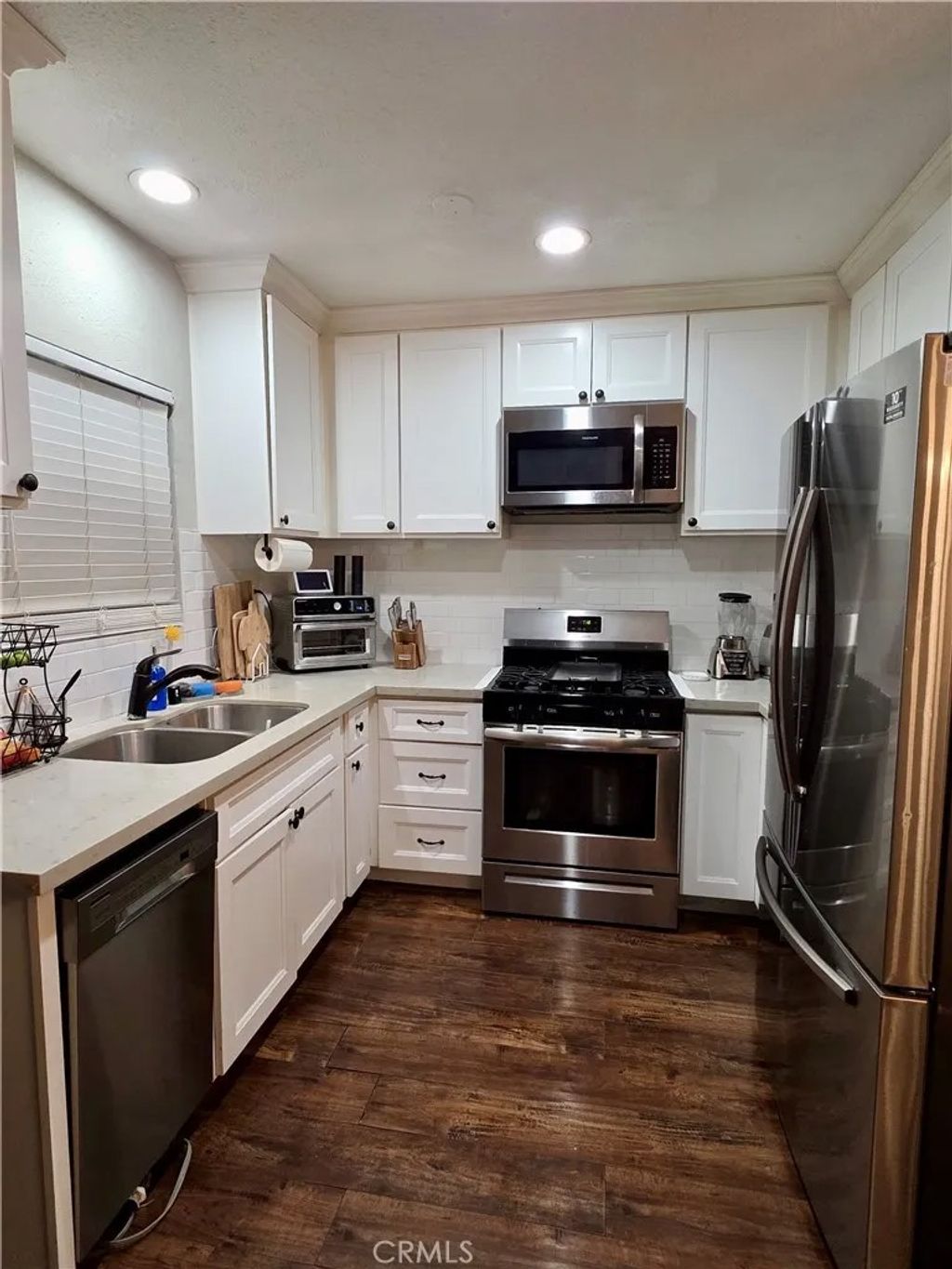 Photo of 540 W 111th Pl, Los Angeles, CA 90044 (MLS # DW26059407)