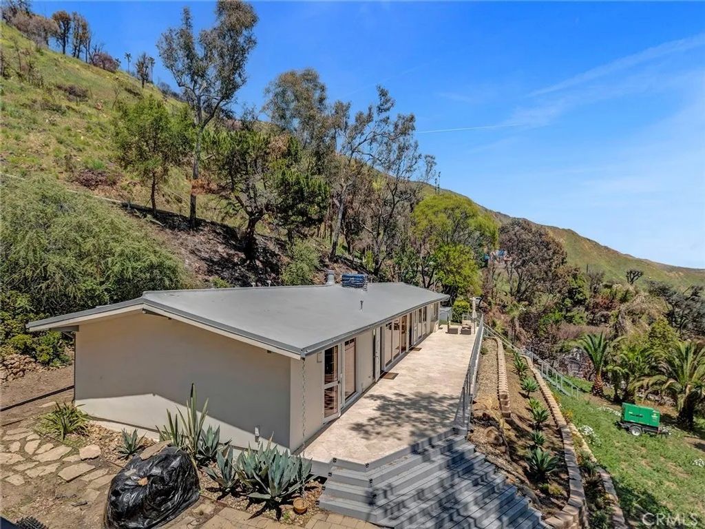 Photo of 20537 Little Rock Way #A, Malibu, CA 90265 (MLS # SR25269563)
