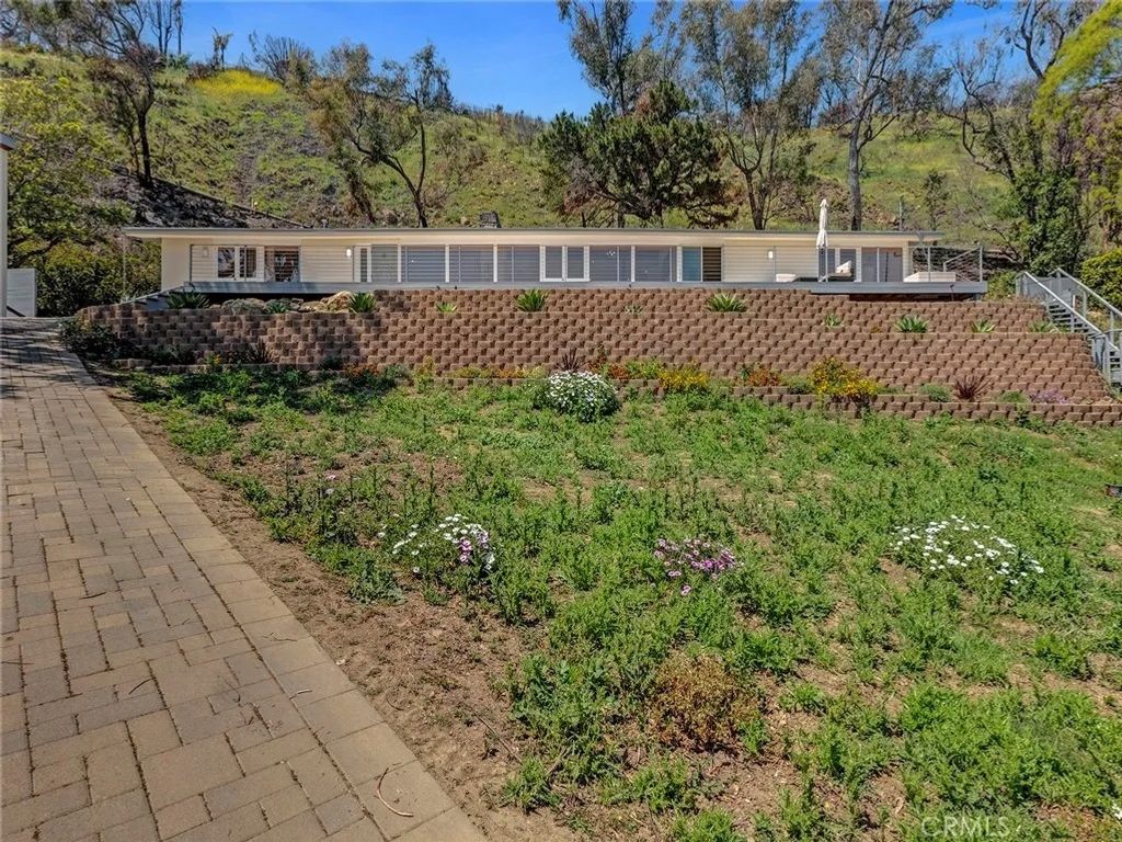 Photo of 20537 Little Rock Way #A, Malibu, CA 90265 (MLS # SR25269563)