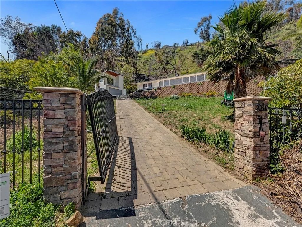 Photo of 20537 Little Rock Way #A, Malibu, CA 90265 (MLS # SR25269563)