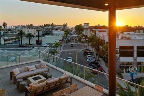 Photo of 414 Main St #410, Huntington Beach, CA 92648 (MLS # OC26067089)