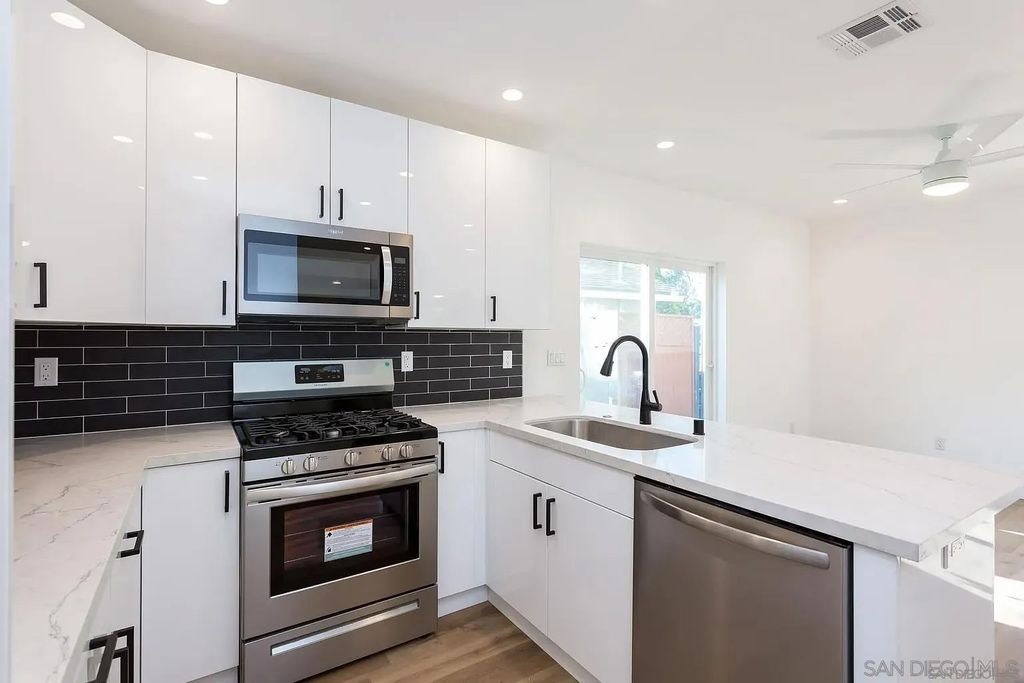 Photo of 5721 Campanile Way, San Diego, CA 92115 (MLS # 260008145)