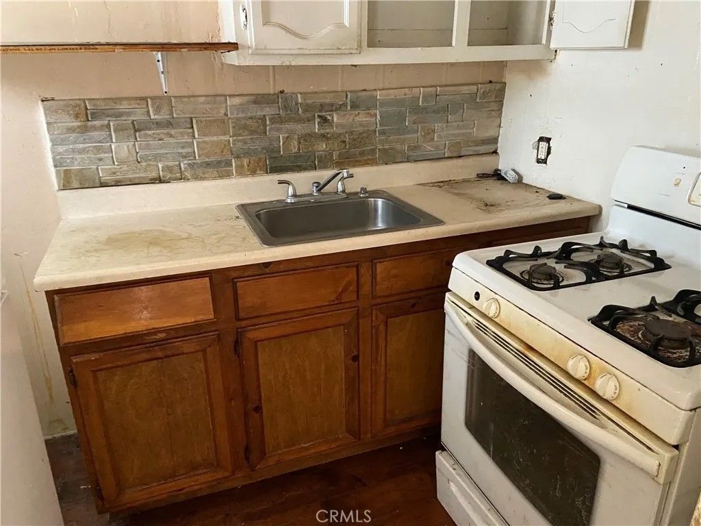 Photo of 12106 S Willowbrook Ave, Compton, CA 90222 (MLS # TR25280588)