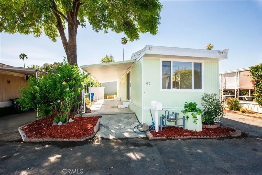 Photo of 6545 Wilbur Ave #92, Reseda, CA 91335 (MLS # SR26085933)