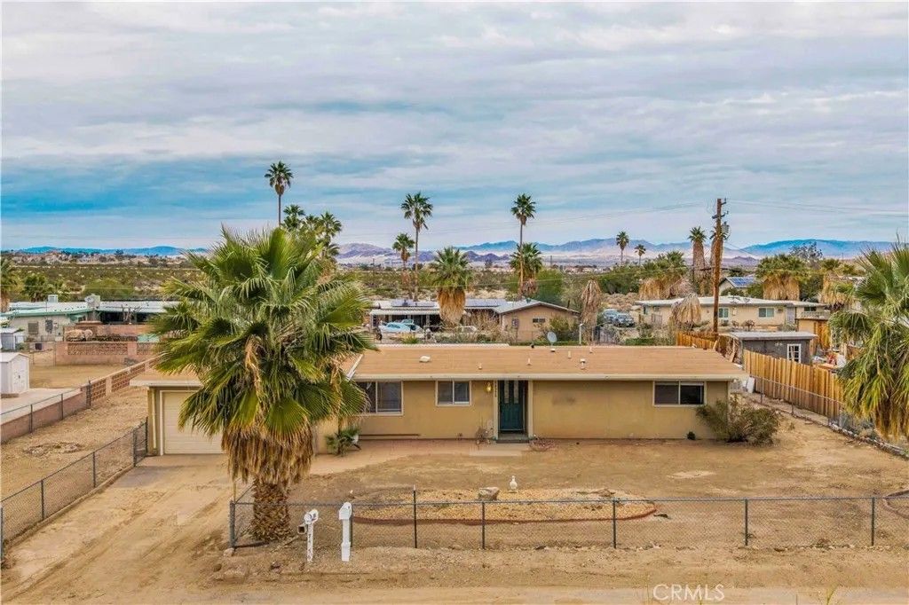 Photo of 74356 Maricopa Dr, 29 Palms, CA 92277 (MLS # JT26000296)