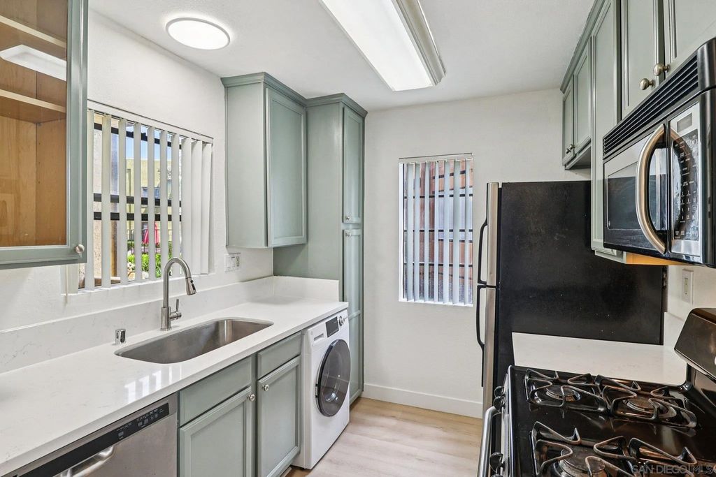 Photo of 10611 SW Dabney Dr #11, San Diego, CA 92126 (MLS # 260009018)