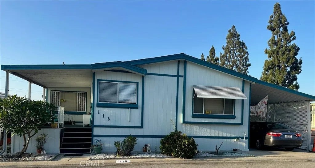 Photo of 8509 Beverly BLVD #116, Pico Rivera, CA 90660 (MLS # DW26123245)