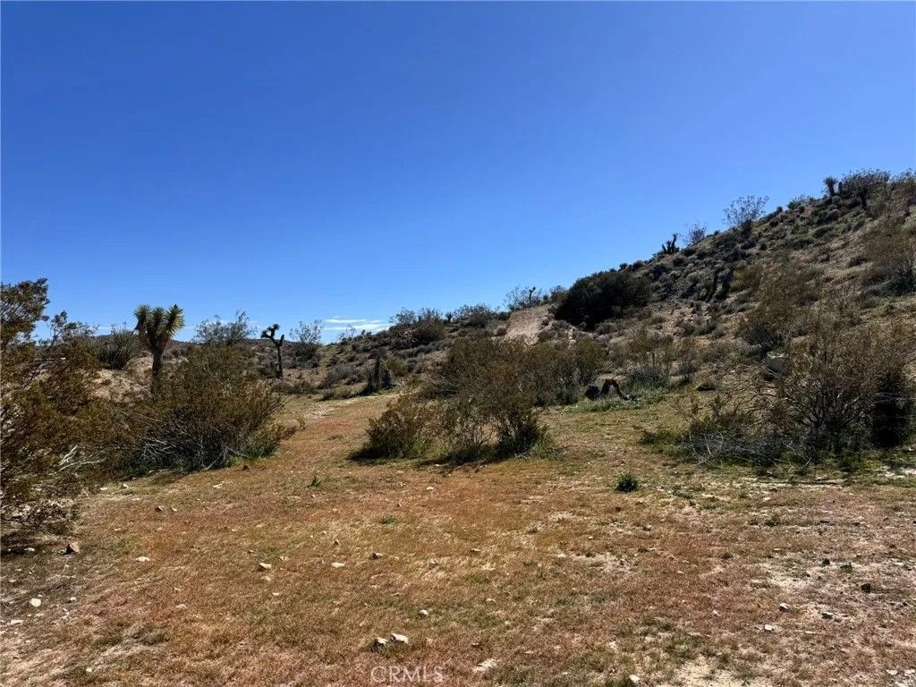 Photo of 0 Hilton, Yucca Valley, CA 92284 (MLS # IV25239042)