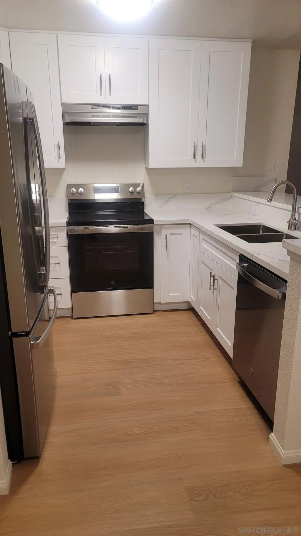 Photo of 6255 Rancho Mission Rd #102, San Diego, CA 92108 (MLS # 250045362)