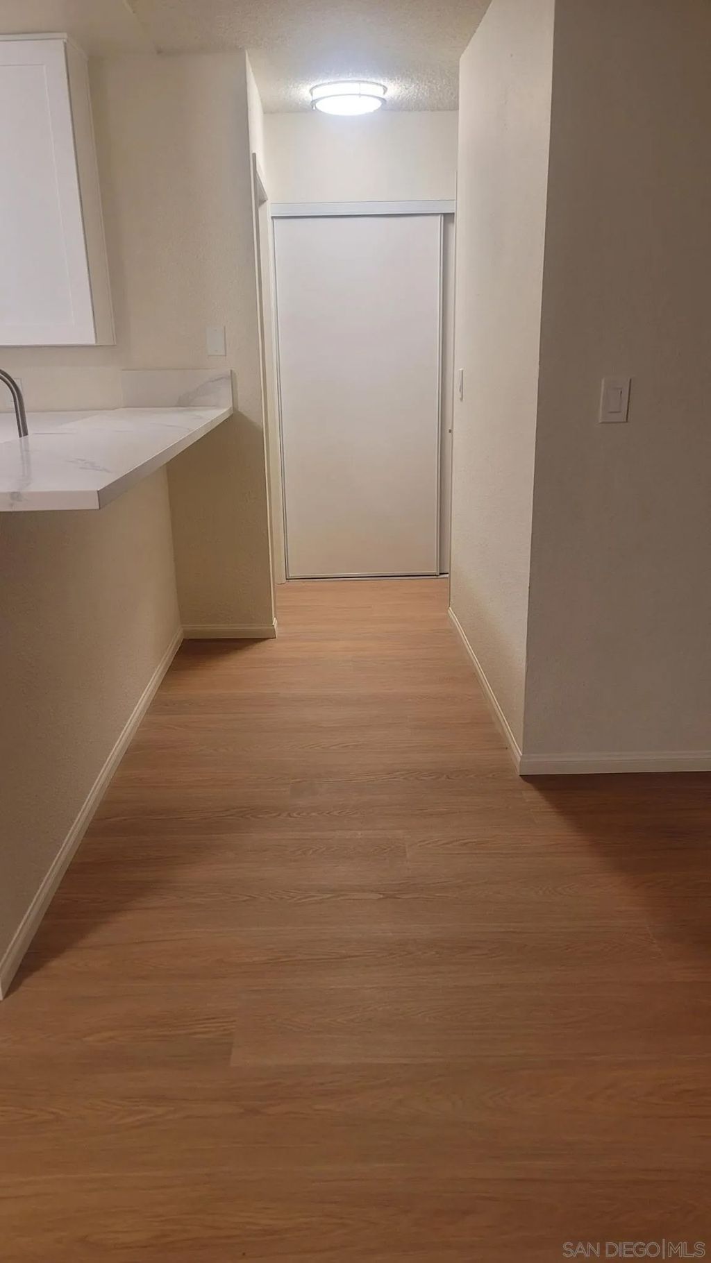 Photo of 6255 Rancho Mission Rd #102, San Diego, CA 92108 (MLS # 250045362)