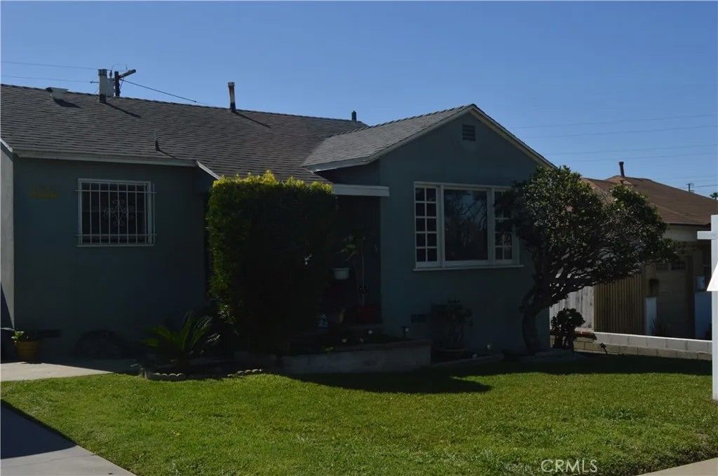 Photo of 1310 Poindexter Street, Los Angeles, CA 90044 (MLS # PW26046718)