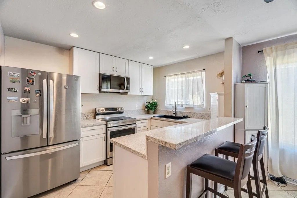 Photo of 1615 Pentecost Way #6, San Diego, CA 92105 (MLS # PTP2603277)