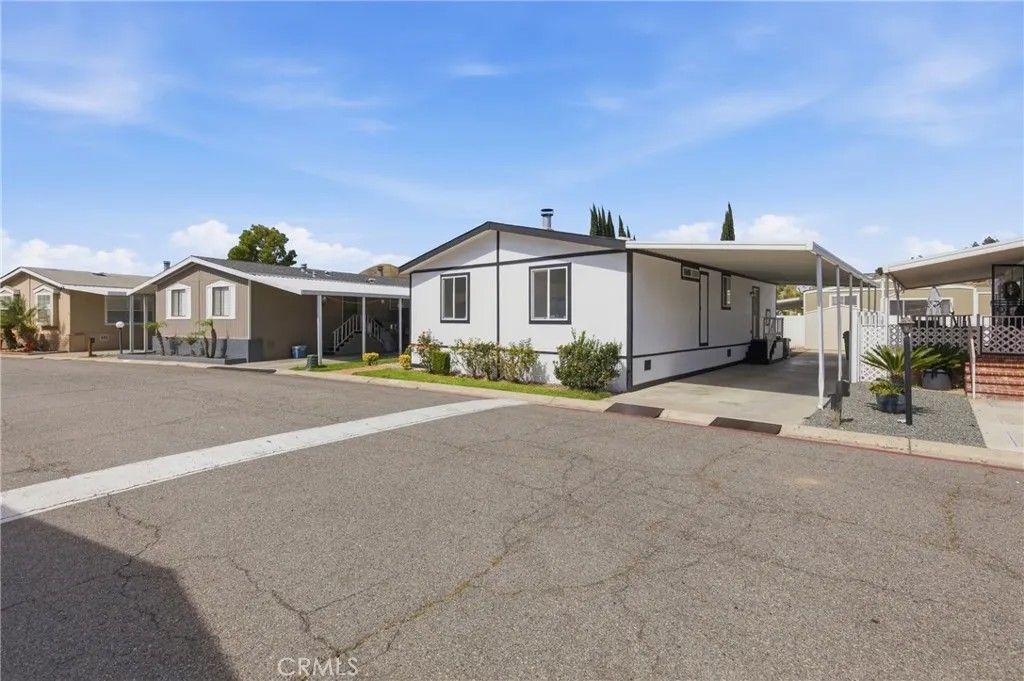 Photo of 4901 Green River #153, Corona, CA 92878 (MLS # PW26010562)
