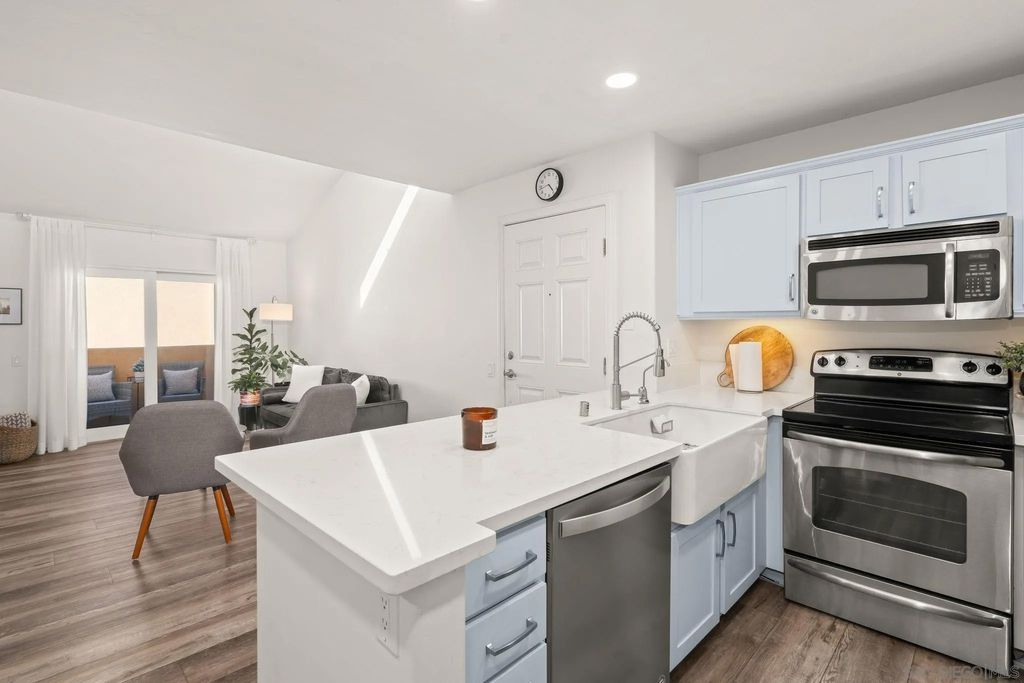 Photo of 5252 Balboa Arms Dr #231, San Diego, CA 92117 (MLS # 260009483)