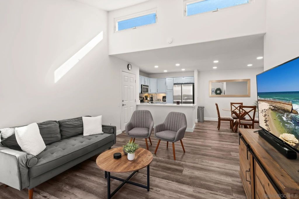 Photo of 5252 Balboa Arms Dr #231, San Diego, CA 92117 (MLS # 260009483)